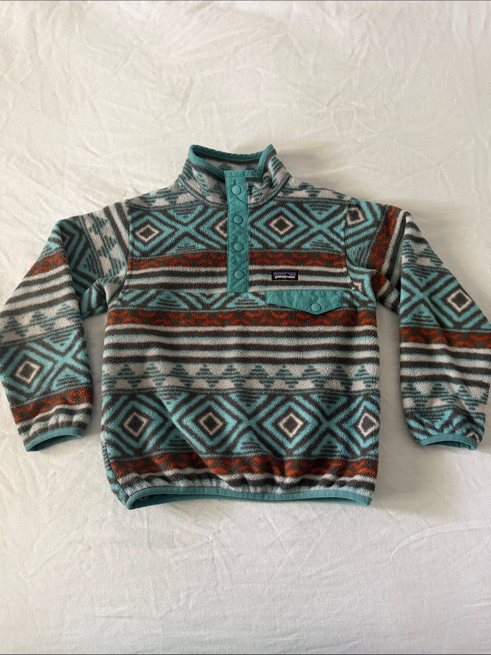 Patagonia kids Teal and Rust Patterned Fleece Snap Pullover